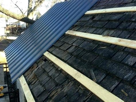 install metal roof on house over shingles|metal roofing directly on shingles.